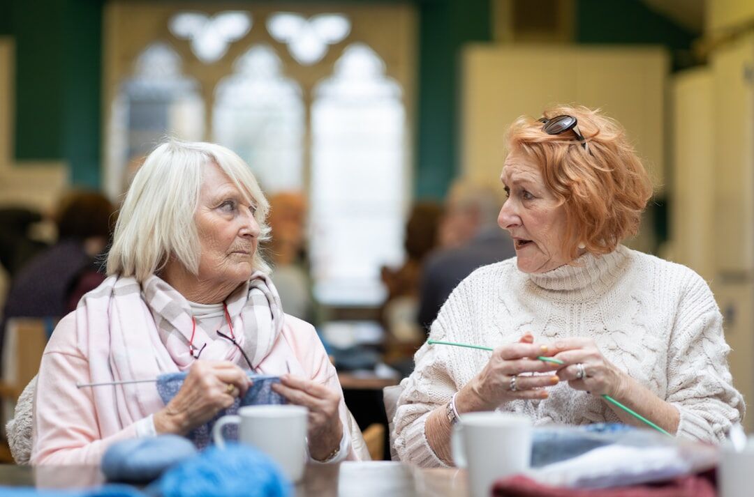elderly women knitting