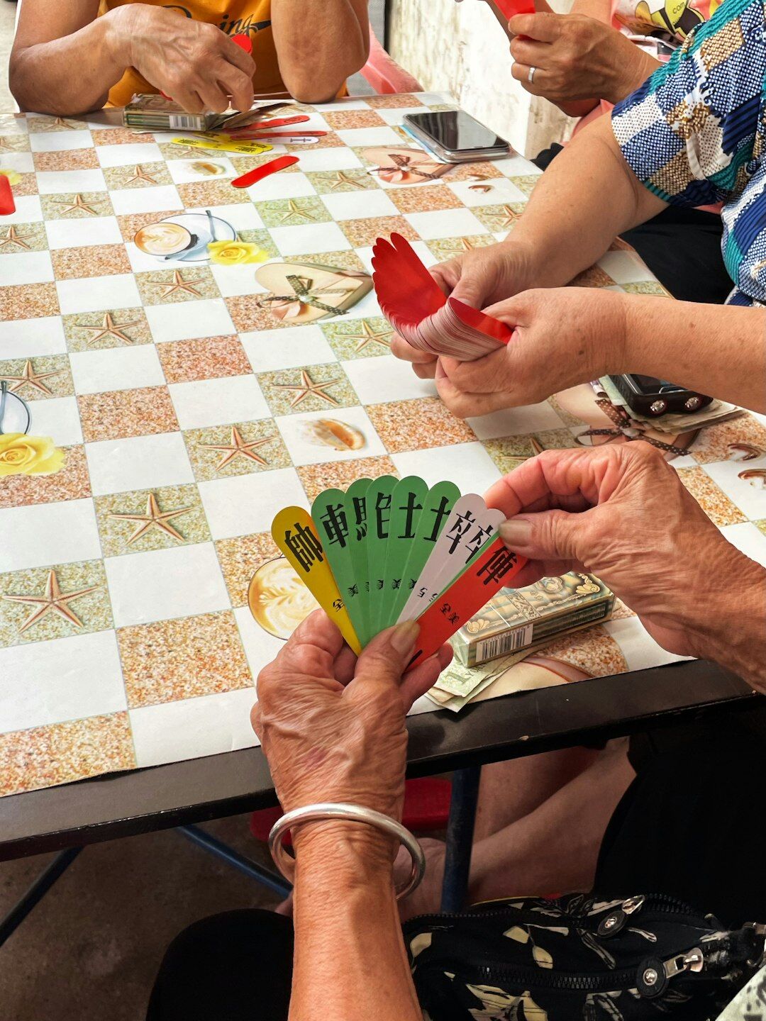 seniors playing cards