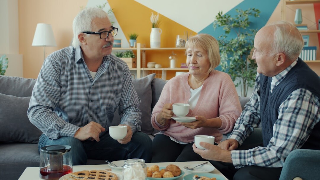 group of seniors enjoying tea together
