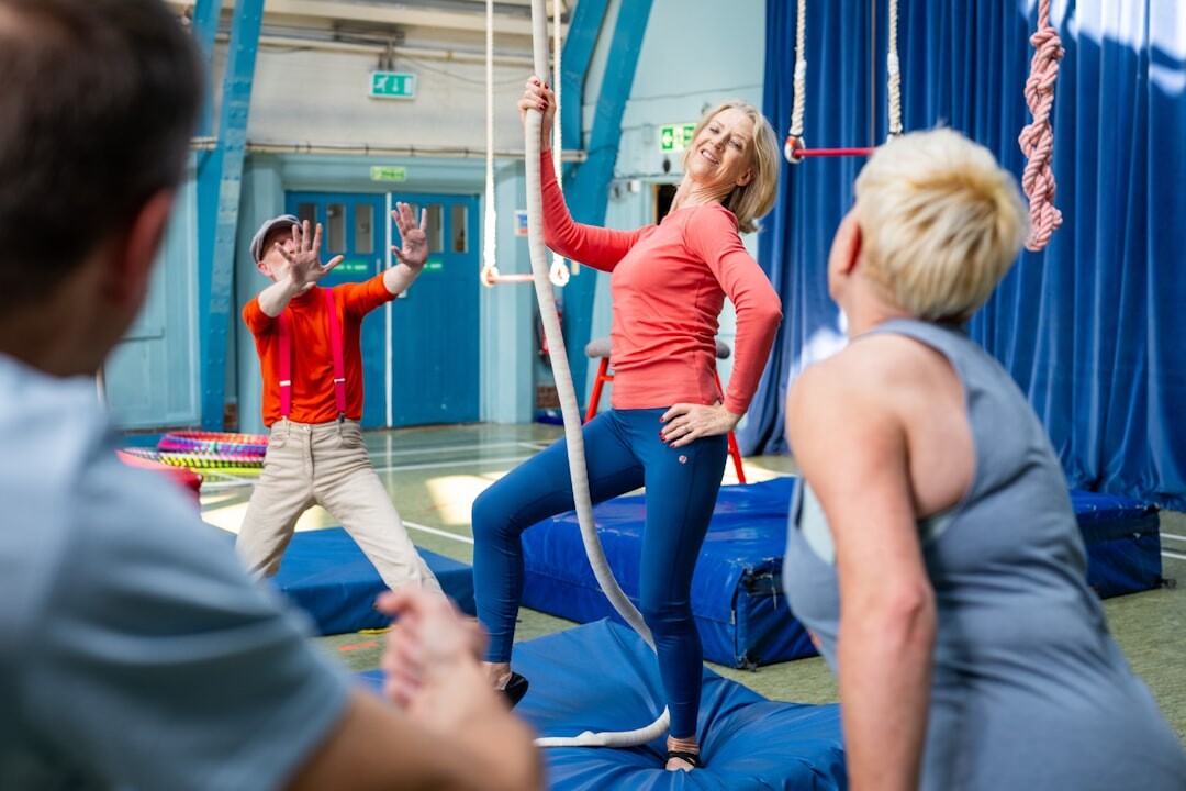 Seniors doing gentle chair exercise class together